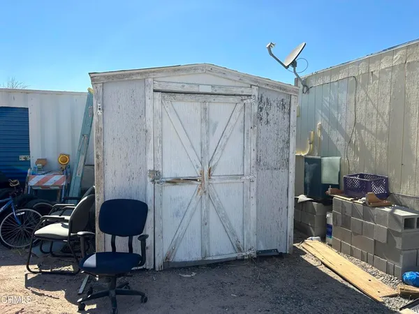 a view of storage and utility room with a sink