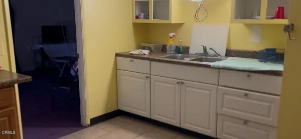 a room with furniture and a mirror