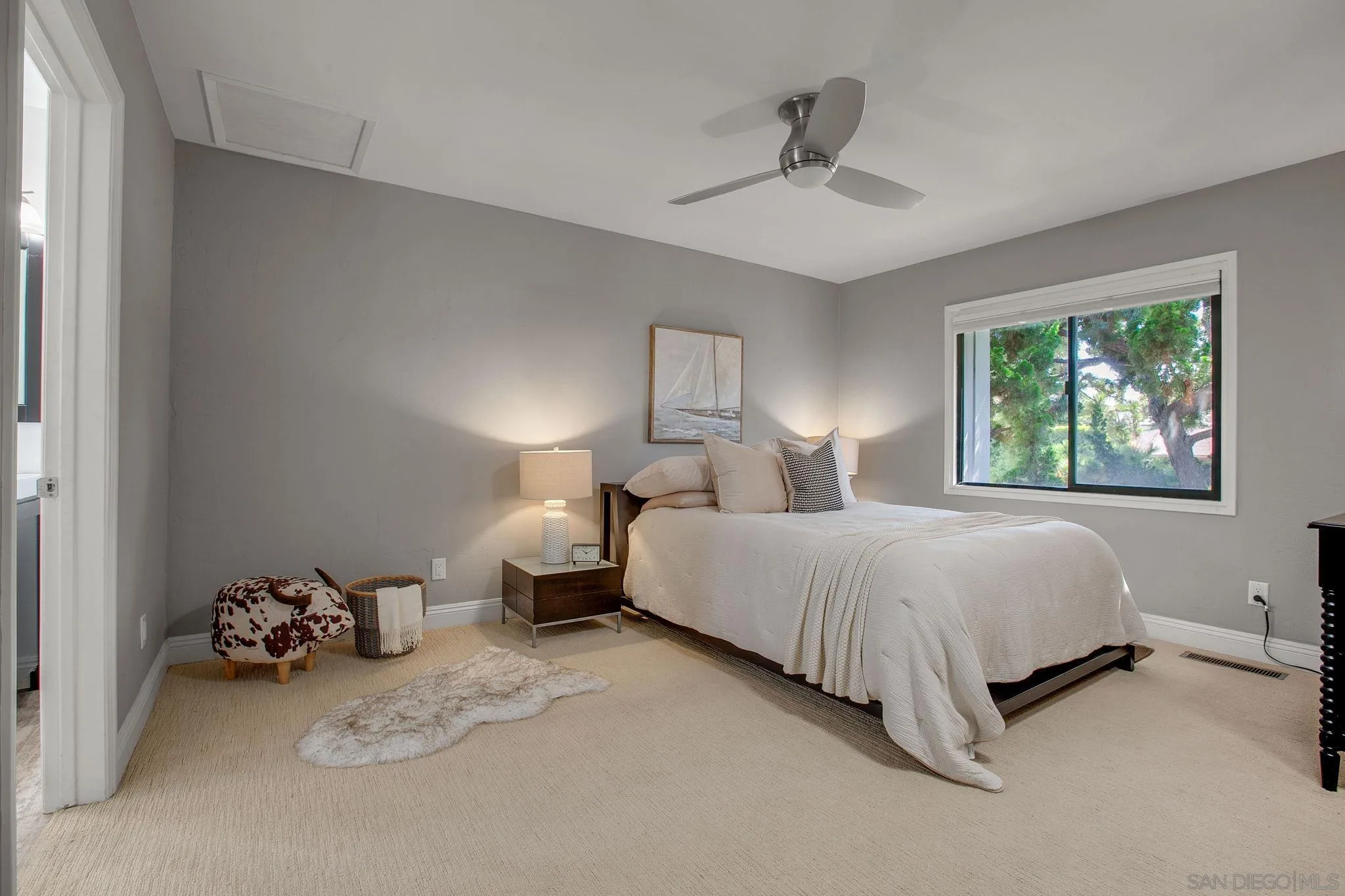 1625 Eolus Avenue Encinitas, CA 92024 - Photo 13 of 37 a bedroom with bed and a window