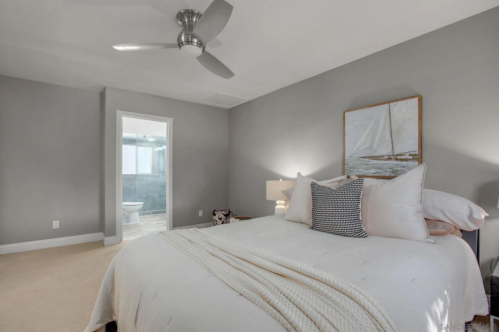 1625 Eolus Avenue Encinitas, CA 92024 - Photo 14 of 37 a bedroom with a bed and window