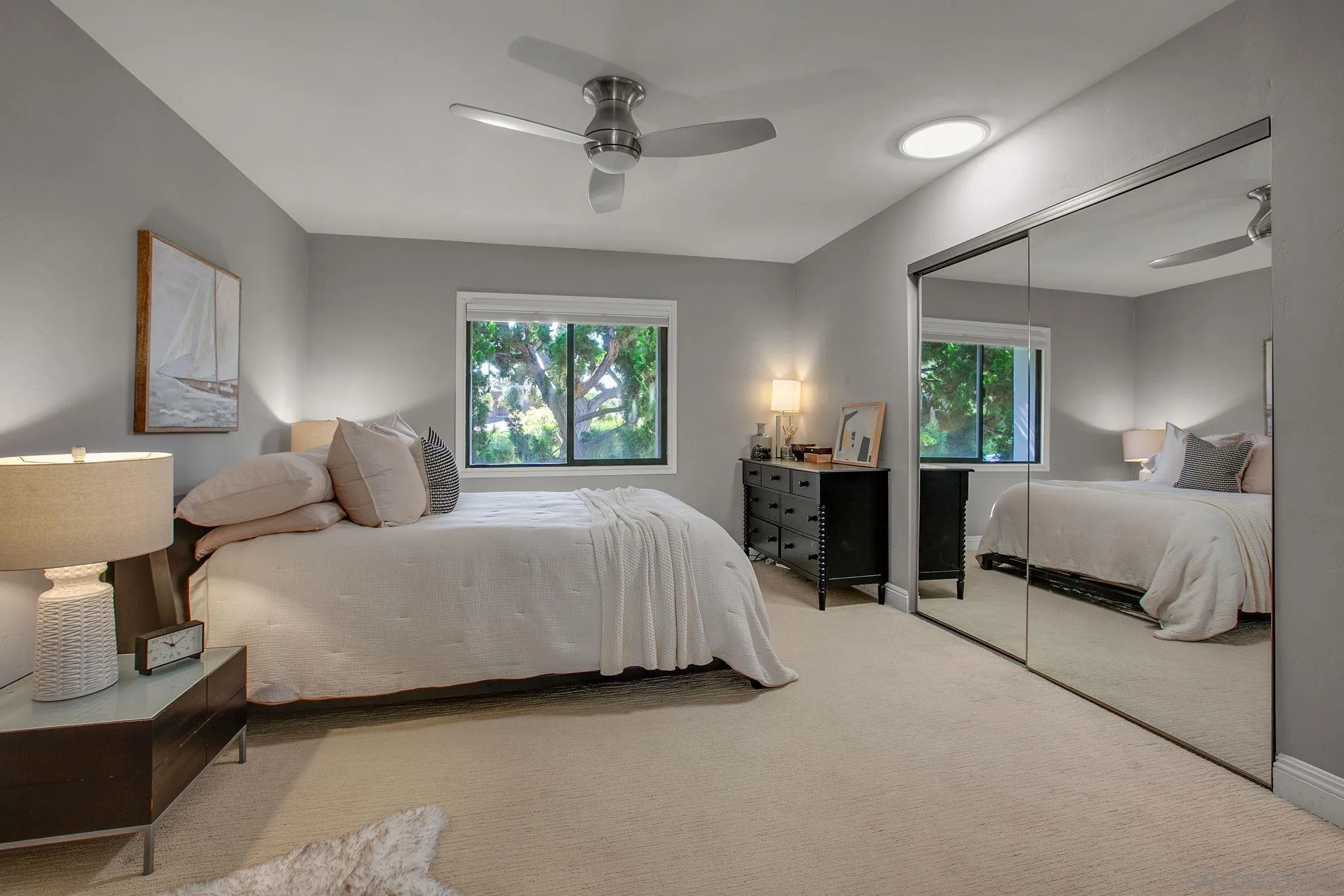 1625 Eolus Avenue Encinitas, CA 92024 - Photo 16 of 37 a bedroom with bed and window