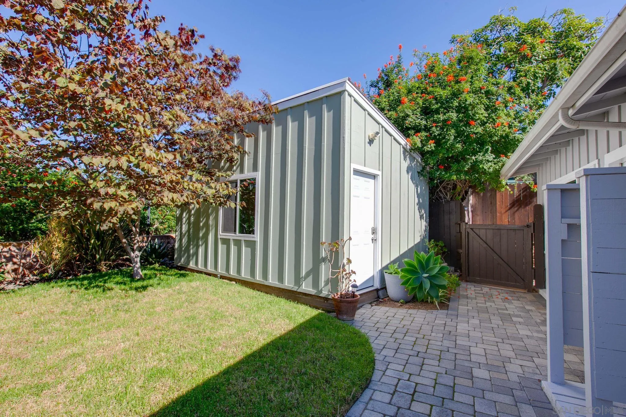 1625 Eolus Avenue Encinitas, CA 92024 - Photo 21 of 37 a front view of a house with garden