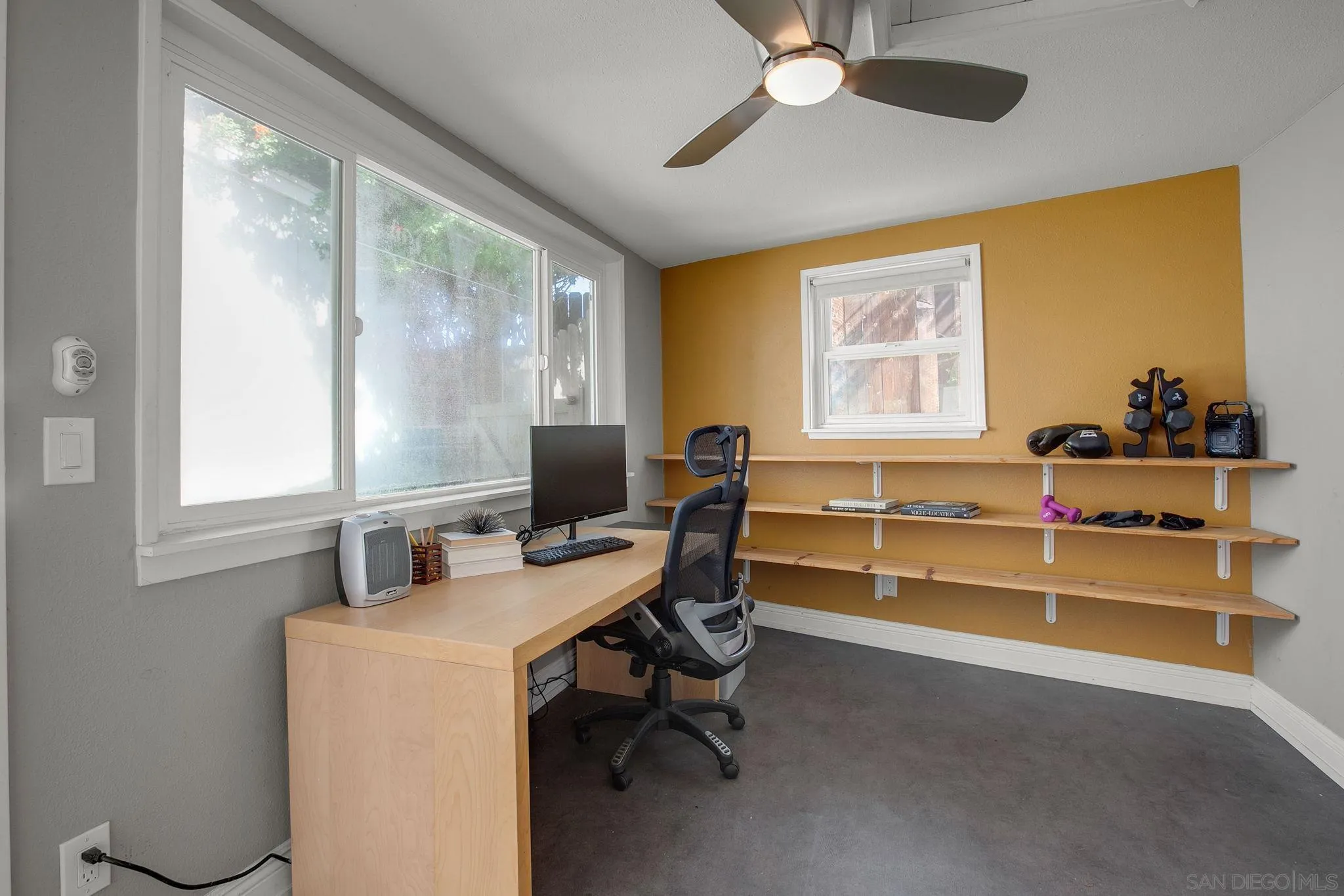 1625 Eolus Avenue Encinitas, CA 92024 - Photo 26 of 37 a view of a workspace with furniture and a window