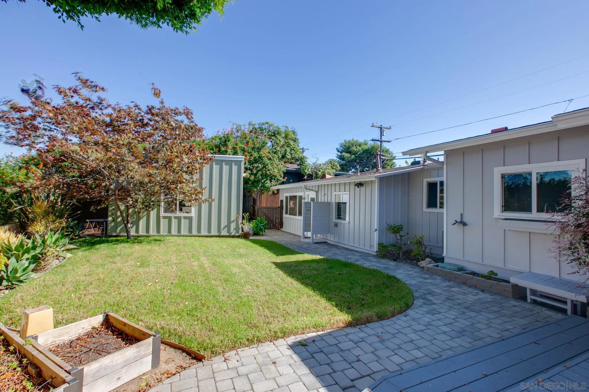1625 Eolus Avenue Encinitas, CA 92024 - Photo 31 of 37 a view of a backyard with plants and a patio