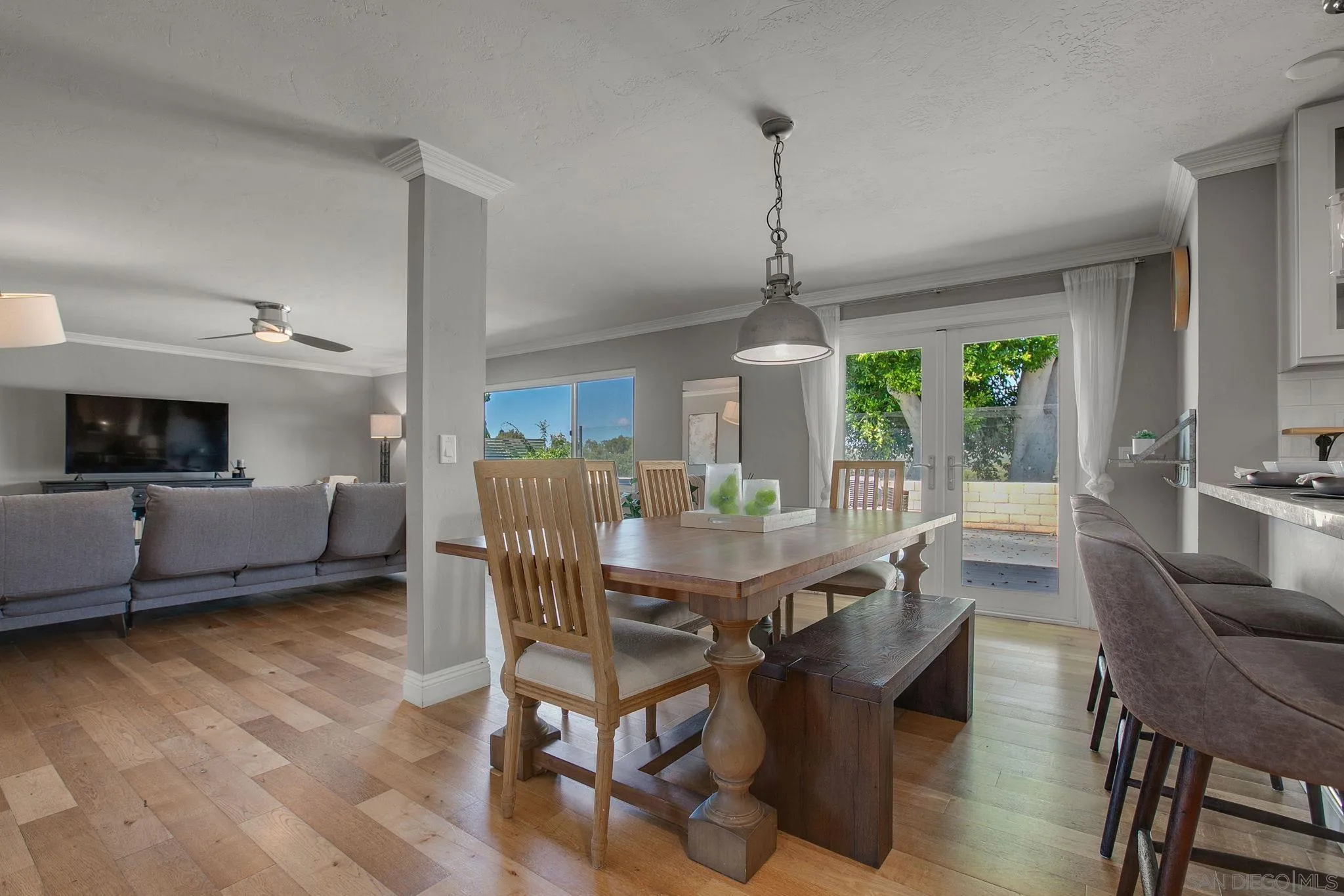 1625 Eolus Avenue Encinitas, CA 92024 - Photo 7 of 37 a view of a dining room with furniture window and wooden floor