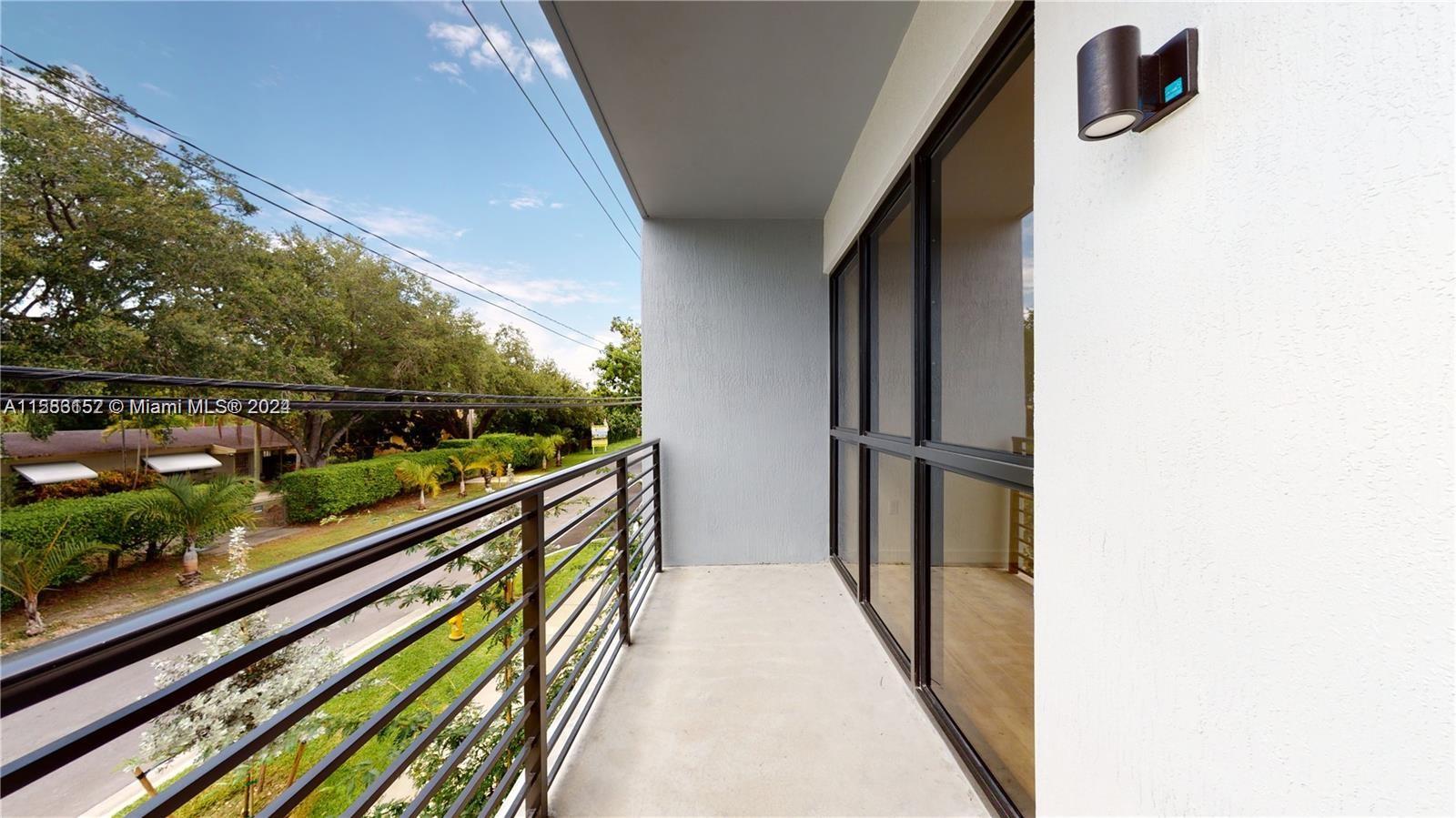 24705 Southwest 129th Avenue, Unit 109 Homestead, FL 33032 - Photo 18 of 22 a view of balcony
