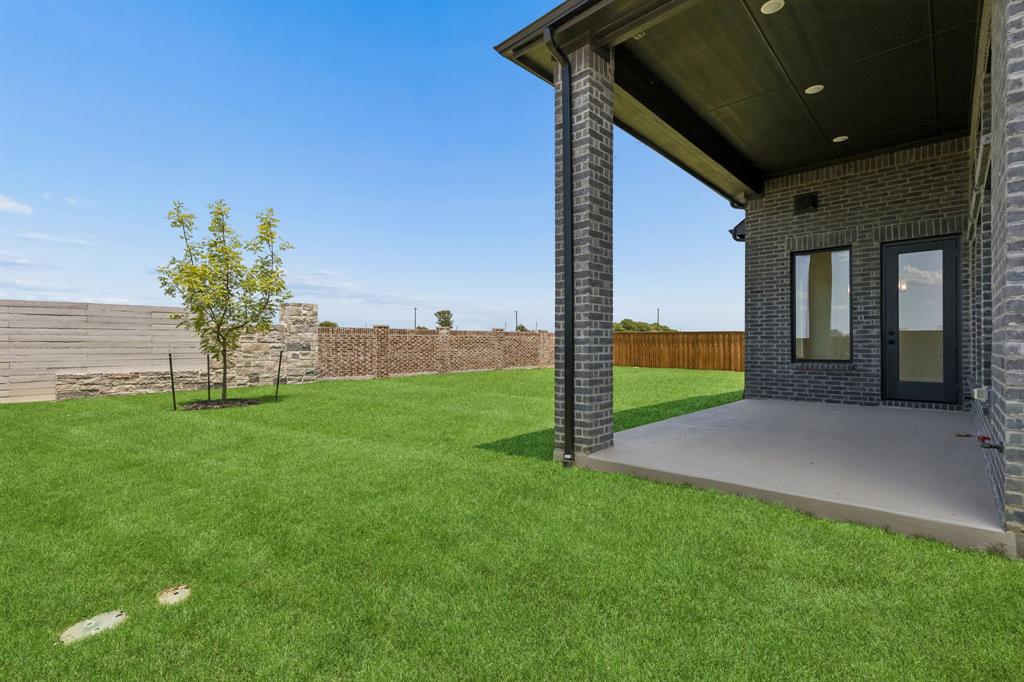 2540 Harpole Road Prosper, TX 75078 - Photo 17 of 19 Dining al fresco is in your future on this wonderful covered back patio!
