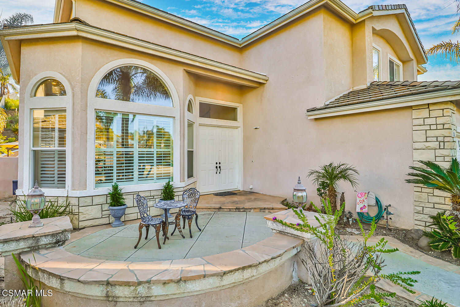 58 Mollison Drive Simi Valley, CA 93065 - Photo 12 of 82 a view of a house with a tub and potted plants