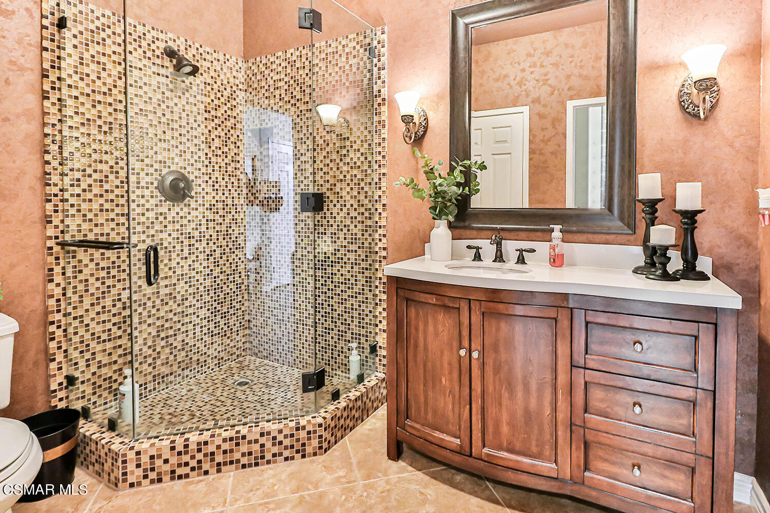 58 Mollison Drive Simi Valley, CA 93065 - Photo 21 of 82 a bathroom with a sink a mirror and shower