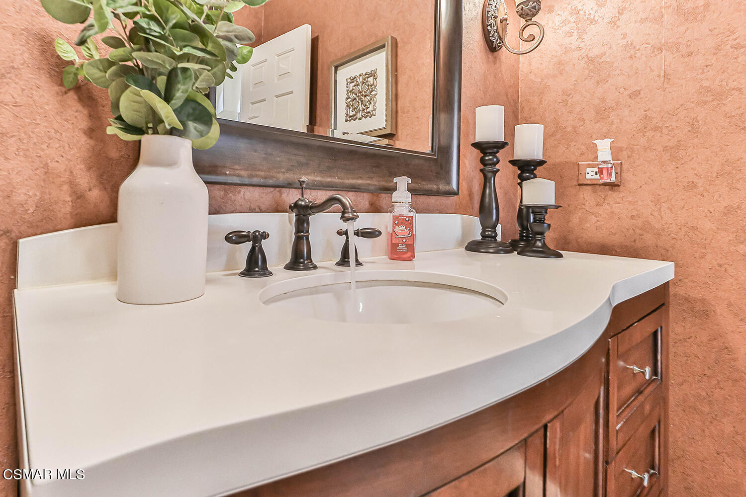 58 Mollison Drive Simi Valley, CA 93065 - Photo 22 of 82 a bathroom with a sink and a mirror