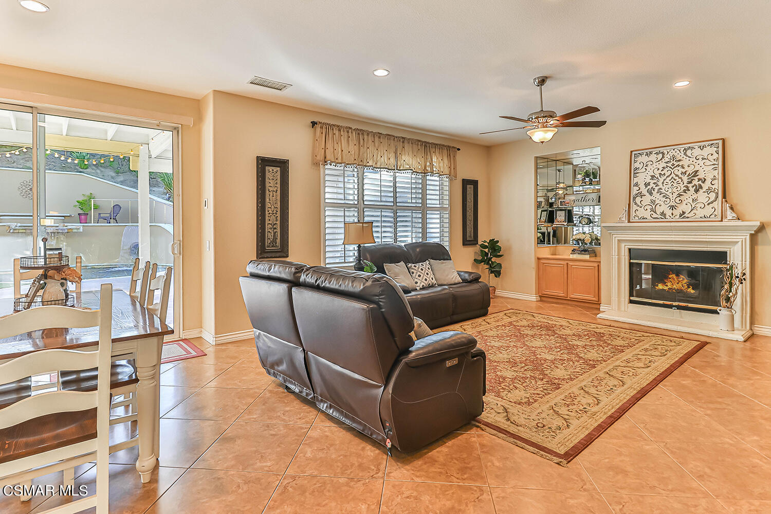58 Mollison Drive Simi Valley, CA 93065 - Photo 24 of 82 a living room with furniture fireplace and large windows