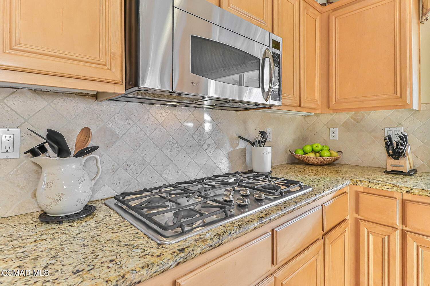 58 Mollison Drive Simi Valley, CA 93065 - Photo 31 of 82 a kitchen with a stove and a microwave