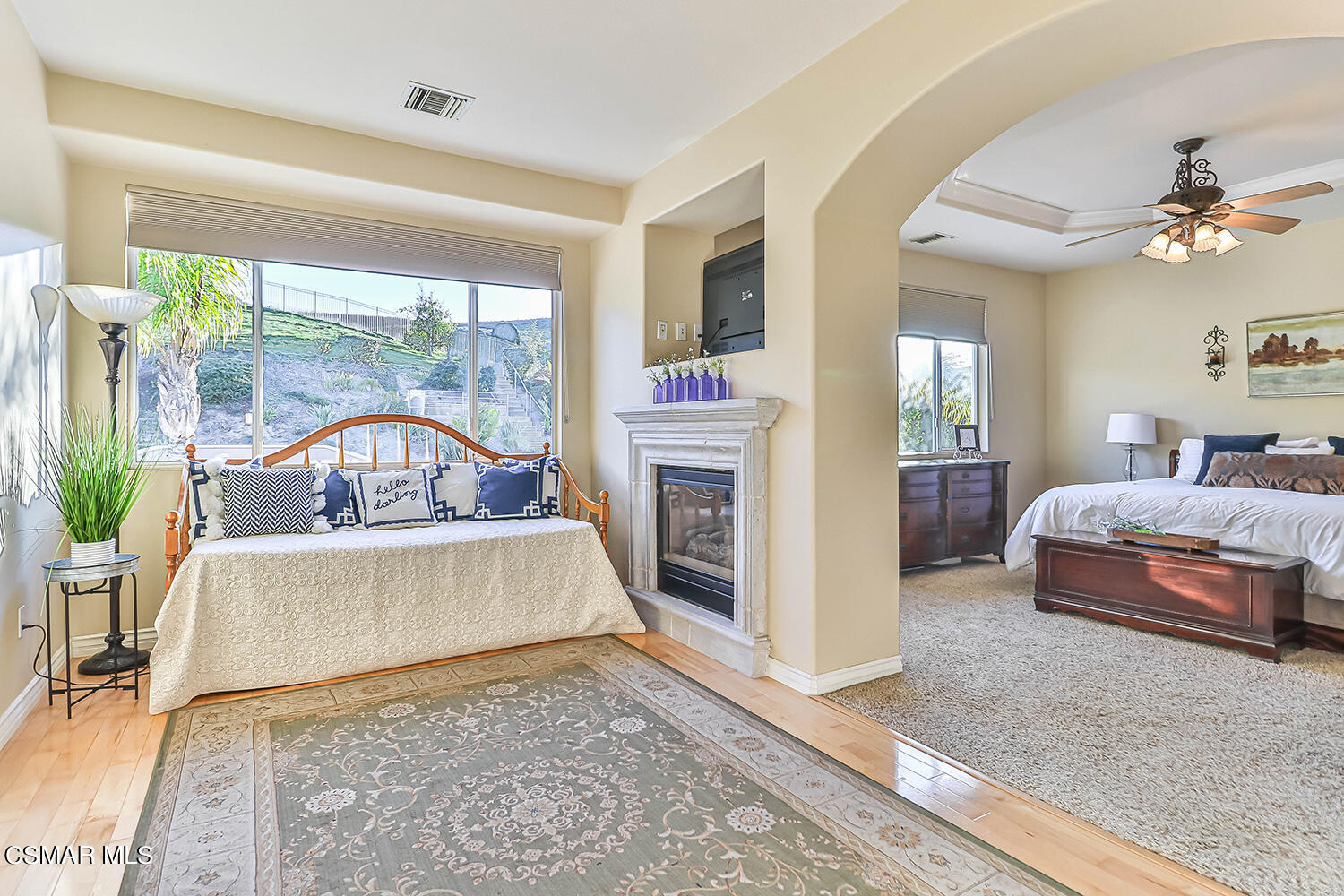 58 Mollison Drive Simi Valley, CA 93065 - Photo 38 of 82 a living room with a bed furniture and a fireplace