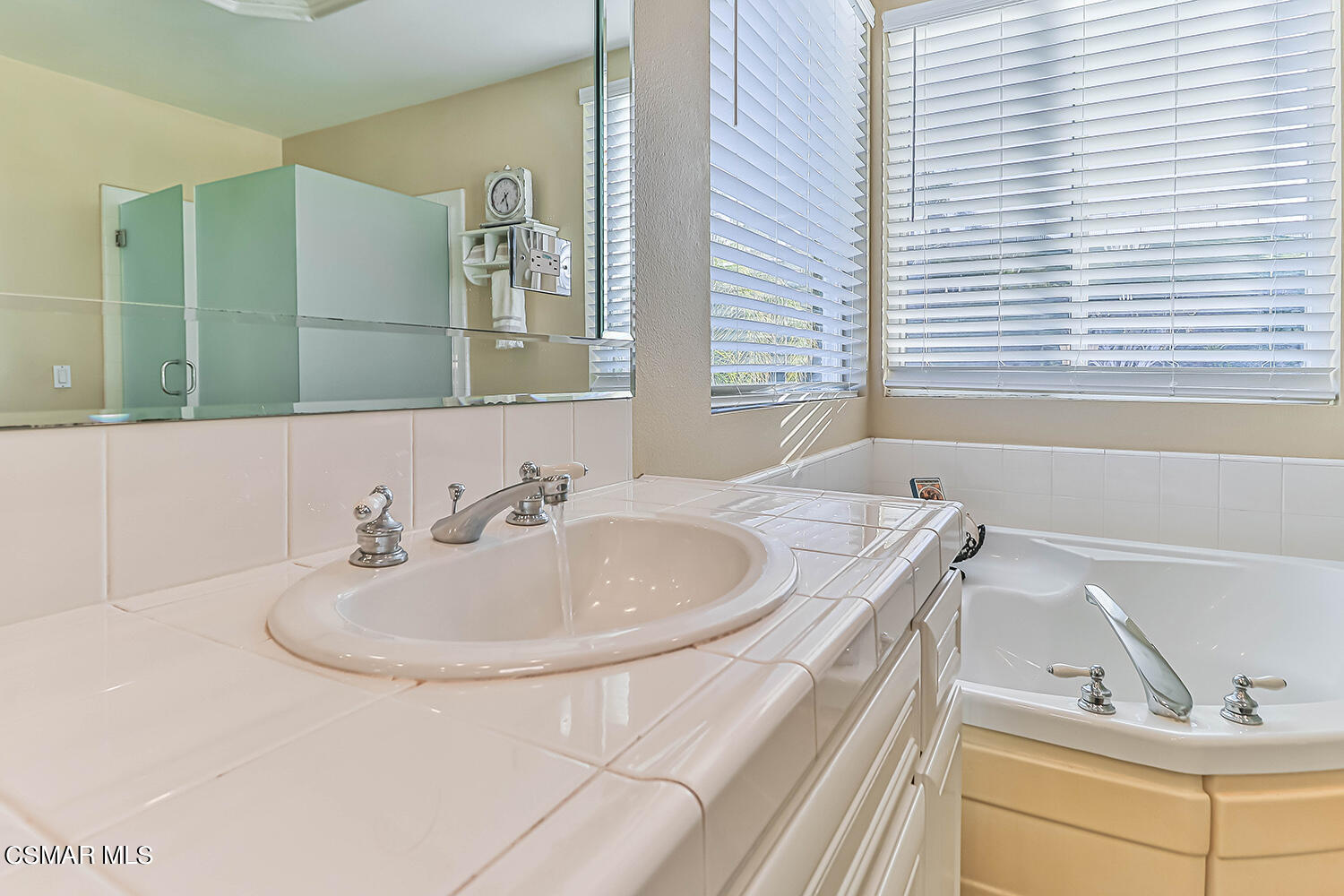58 Mollison Drive Simi Valley, CA 93065 - Photo 43 of 82 a bathroom with a sink and a bathtub