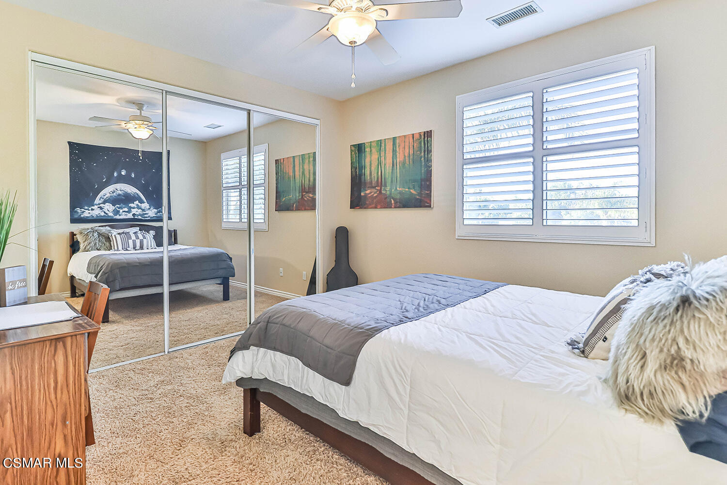 58 Mollison Drive Simi Valley, CA 93065 - Photo 48 of 82 a bedroom with a bed and a chandelier