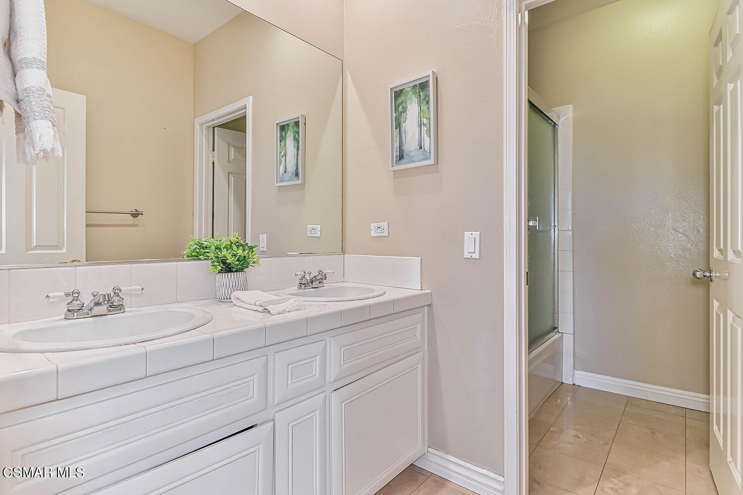 58 Mollison Drive Simi Valley, CA 93065 - Photo 52 of 82 a bathroom with a sink and a mirror