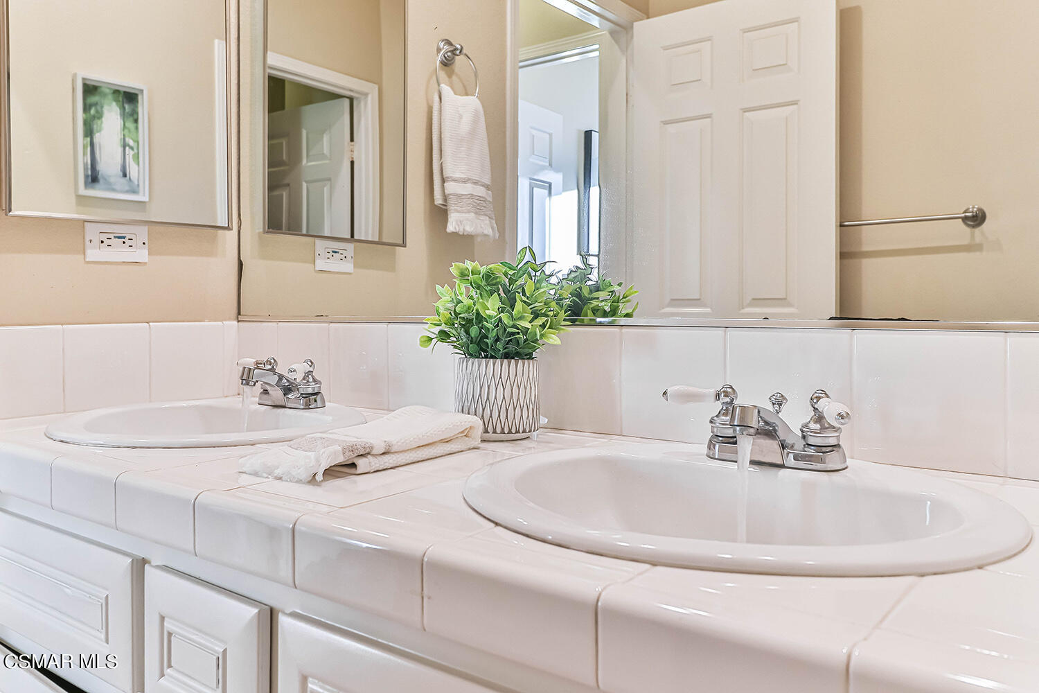 58 Mollison Drive Simi Valley, CA 93065 - Photo 53 of 82 a bathroom with a sink and a mirror