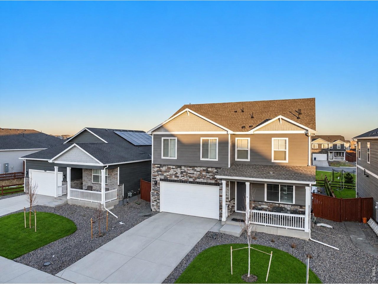 439 Bluebird Road Johnstown, CO 80534 - Photo 2 of 36 a front view of a house with garden