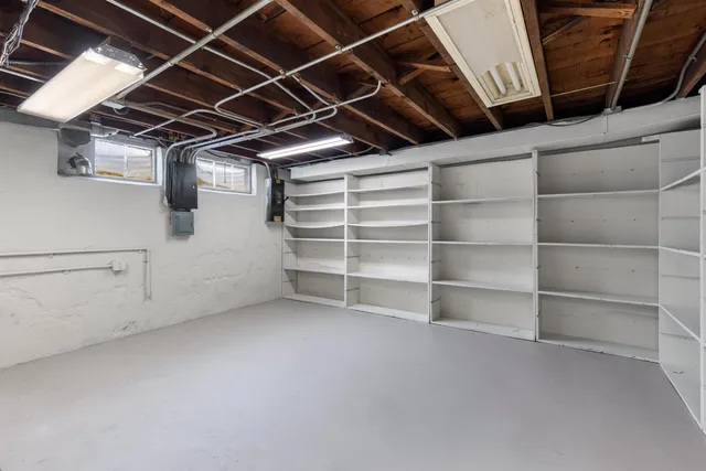 a utility room with closet dryer and washer