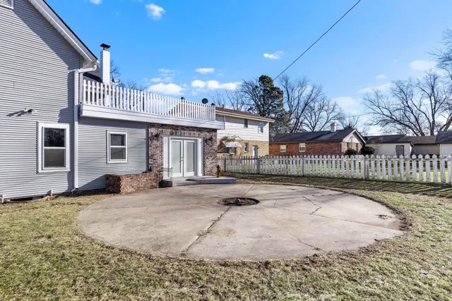 a view of a house with a patio