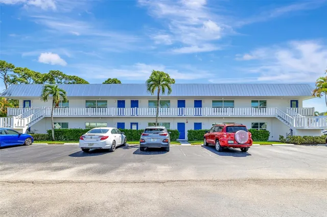 a utility room with a sink dryer and washer