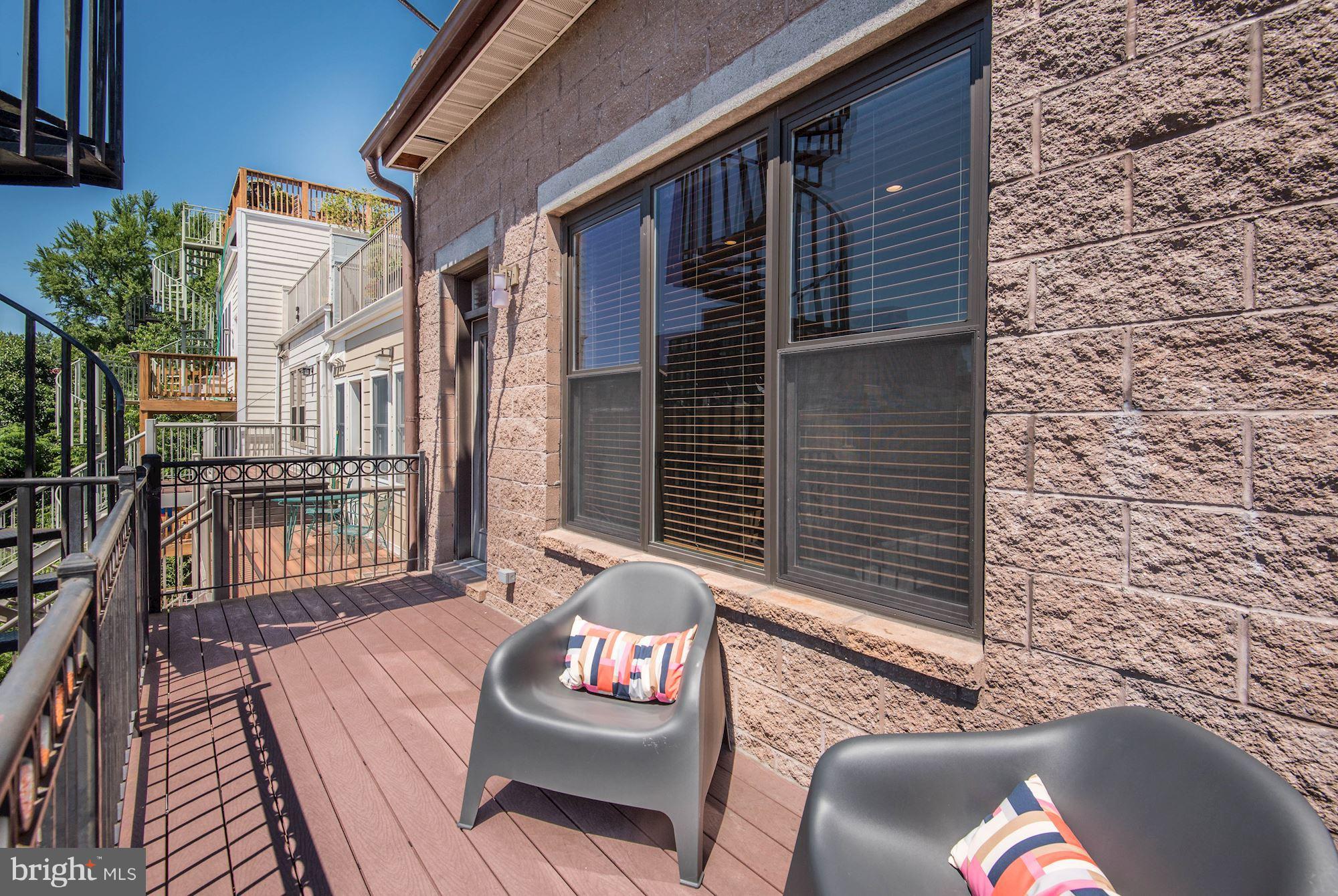 2444 Ontario Road Northwest, Unit 4 Washington, DC 20009 - Photo 23 of 26 a view of deck with patio
