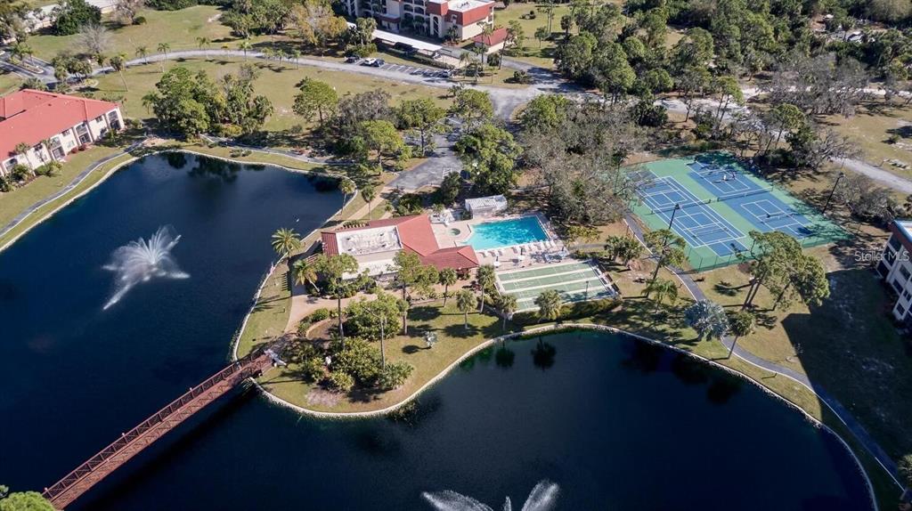 23465 Harbor View Road, Unit 1006 Punta Gorda, FL 33980 - Photo 36 of 41 an aerial view of a house with a yard