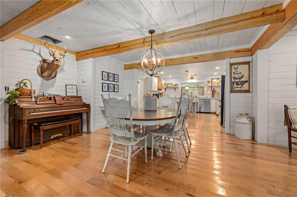 385 Amy's Road Clarkesville, GA 30523 - Photo 13 of 57 a dining room with furniture and wooden floor