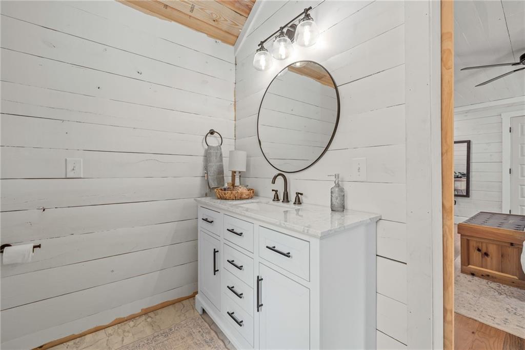 385 Amy's Road Clarkesville, GA 30523 - Photo 24 of 57 a bathroom with a sink and a mirror