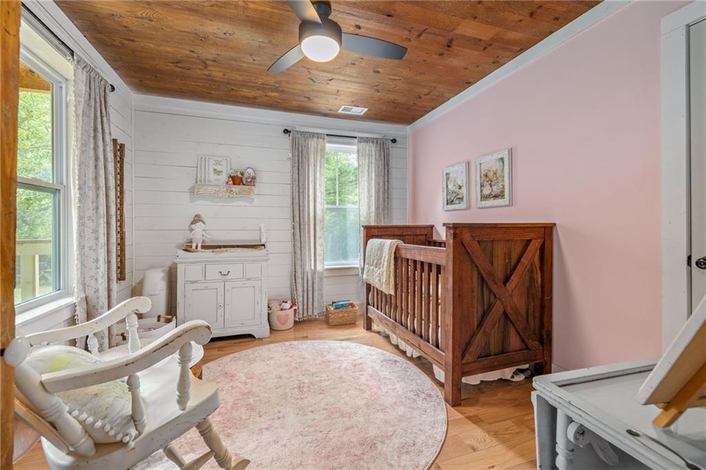 385 Amy's Road Clarkesville, GA 30523 - Photo 26 of 57 a living room with furniture and a flat screen tv