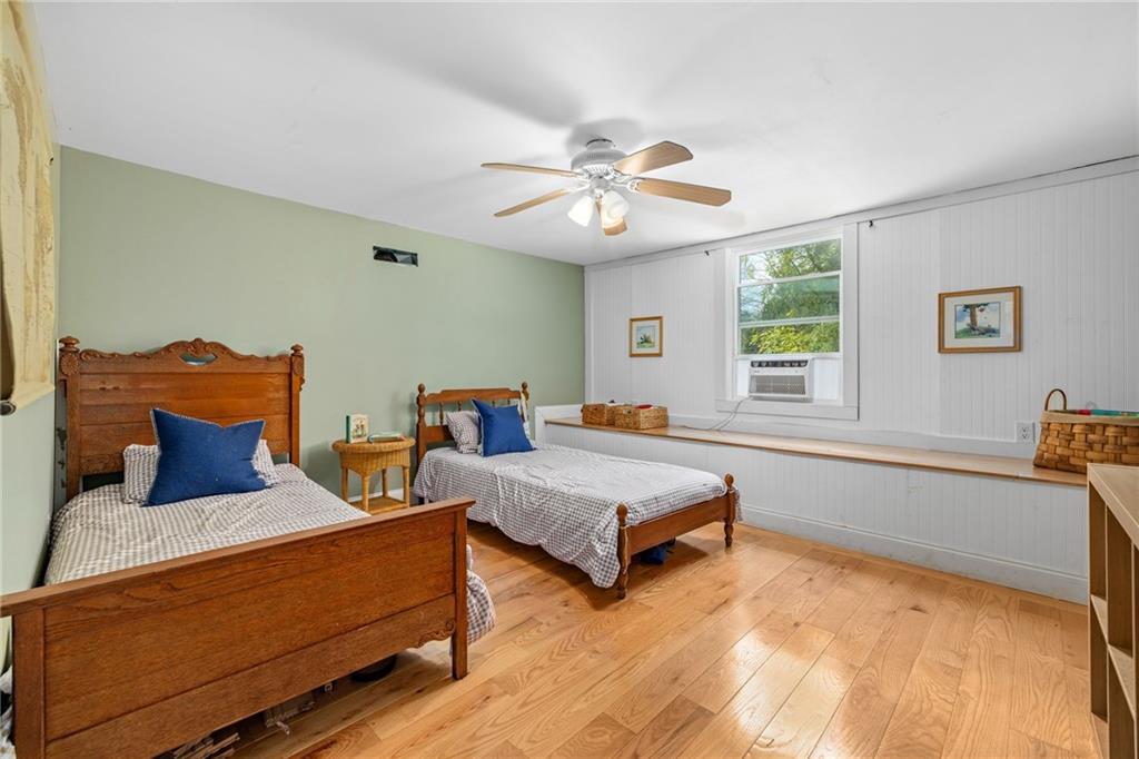 385 Amy's Road Clarkesville, GA 30523 - Photo 33 of 57 a bedroom with furniture and a window