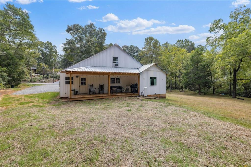 385 Amy's Road Clarkesville, GA 30523 - Photo 38 of 57 a house with trees in the background