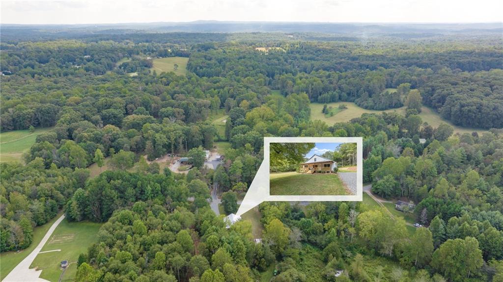 385 Amy's Road Clarkesville, GA 30523 - Photo 56 of 57 an aerial view of residential houses with outdoor space and trees