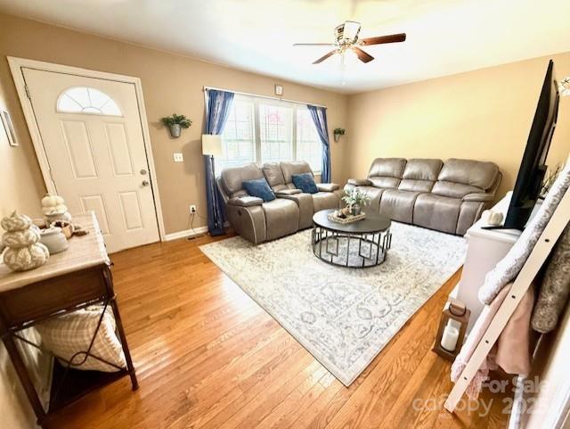 114 Yates Street Dallas, NC 28034 - Photo 15 of 41 a living room with furniture and a table