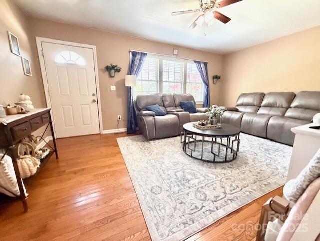 114 Yates Street Dallas, NC 28034 - Photo 20 of 41 a living room with furniture rug and a window