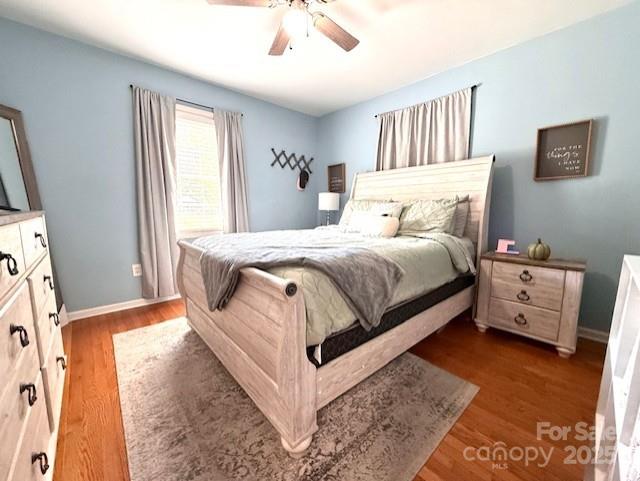 114 Yates Street Dallas, NC 28034 - Photo 33 of 41 a bedroom with a bed and a window