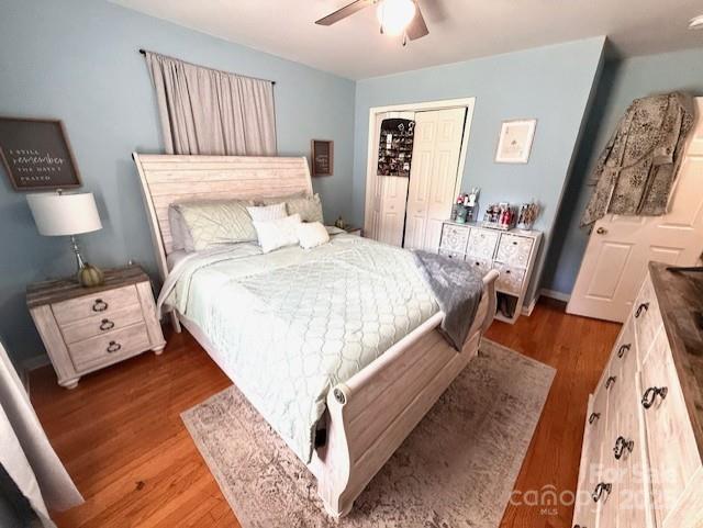 114 Yates Street Dallas, NC 28034 - Photo 35 of 41 a large bed sitting in a bedroom and a table