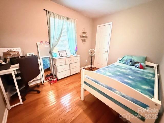 114 Yates Street Dallas, NC 28034 - Photo 38 of 41 a bedroom with a bed and a window