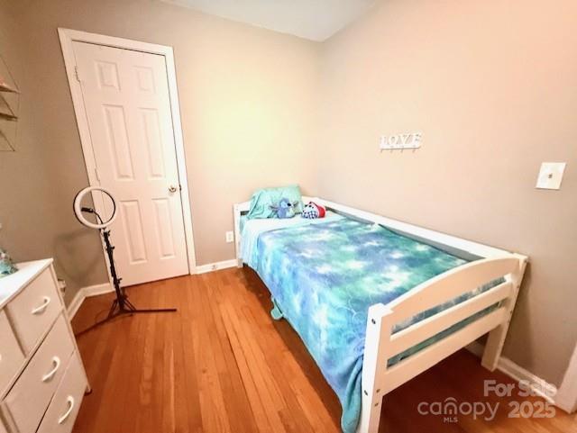 114 Yates Street Dallas, NC 28034 - Photo 39 of 41 a view of a room with wooden floor