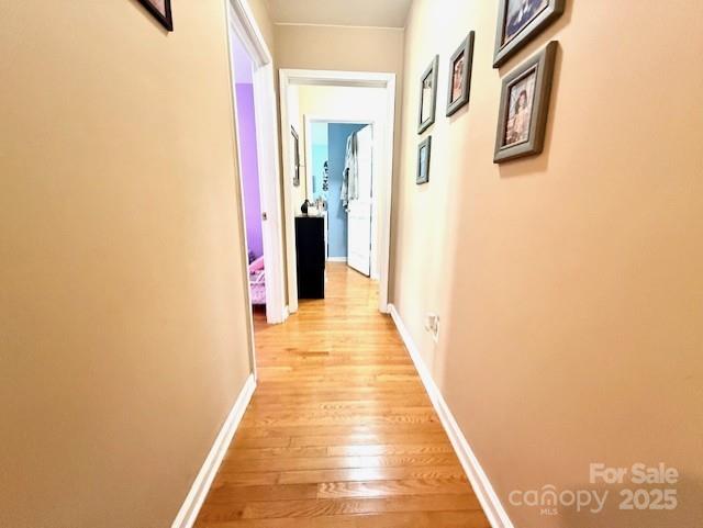 114 Yates Street Dallas, NC 28034 - Photo 40 of 41 a view of a hallway with wooden floor