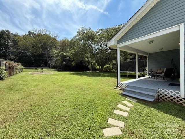 114 Yates Street Dallas, NC 28034 - Photo 8 of 41 a view of a house with a yard porch and sitting area