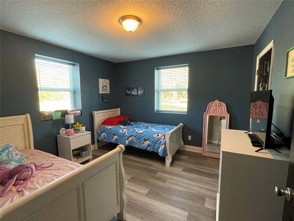 2707 Jane Lane Hilliard, FL 32046 - Photo 16 of 26 a living room with furniture and a window