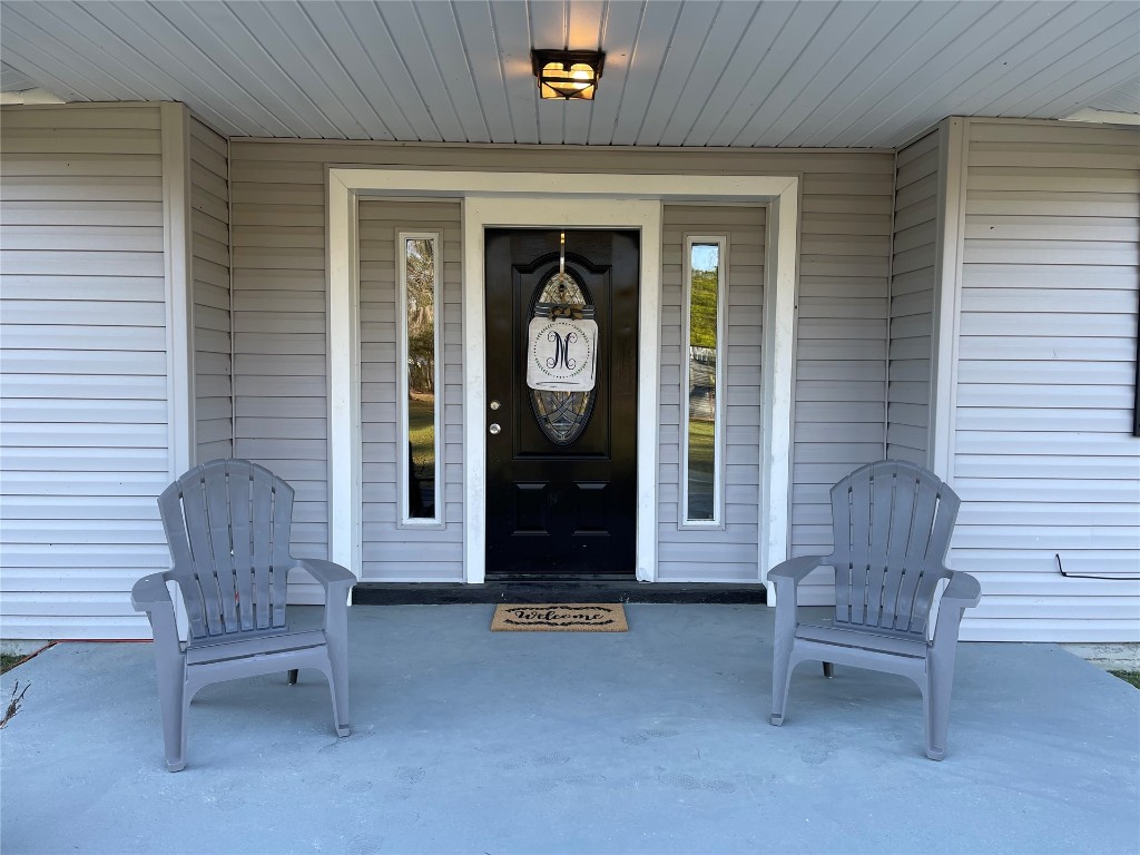 2707 Jane Lane Hilliard, FL 32046 - Photo 2 of 26 a front view of a house with entryway