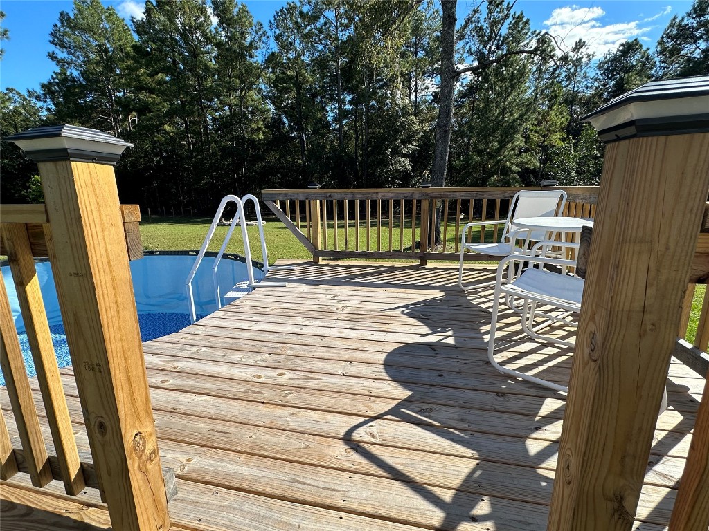 2707 Jane Lane Hilliard, FL 32046 - Photo 25 of 26 a view of deck with patio