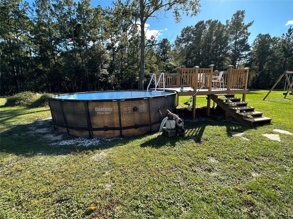 2707 Jane Lane Hilliard, FL 32046 - Photo 26 of 26 a view of swimming pool with a lounge chair