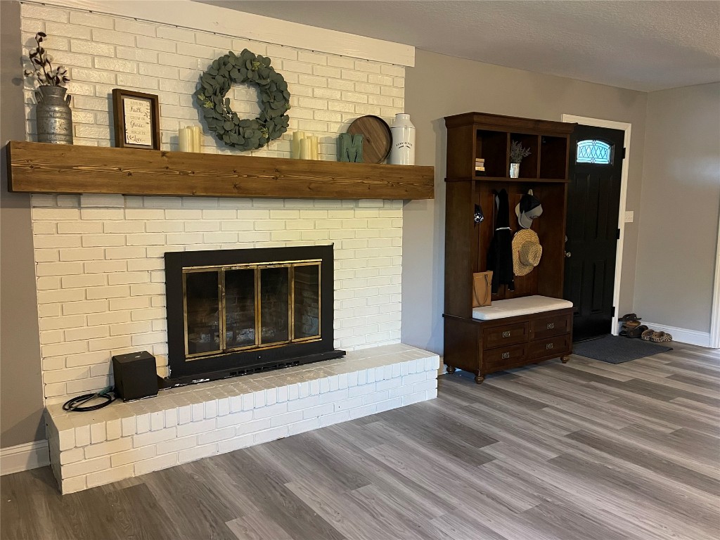 2707 Jane Lane Hilliard, FL 32046 - Photo 5 of 26 a view of fireplace and wooden floor