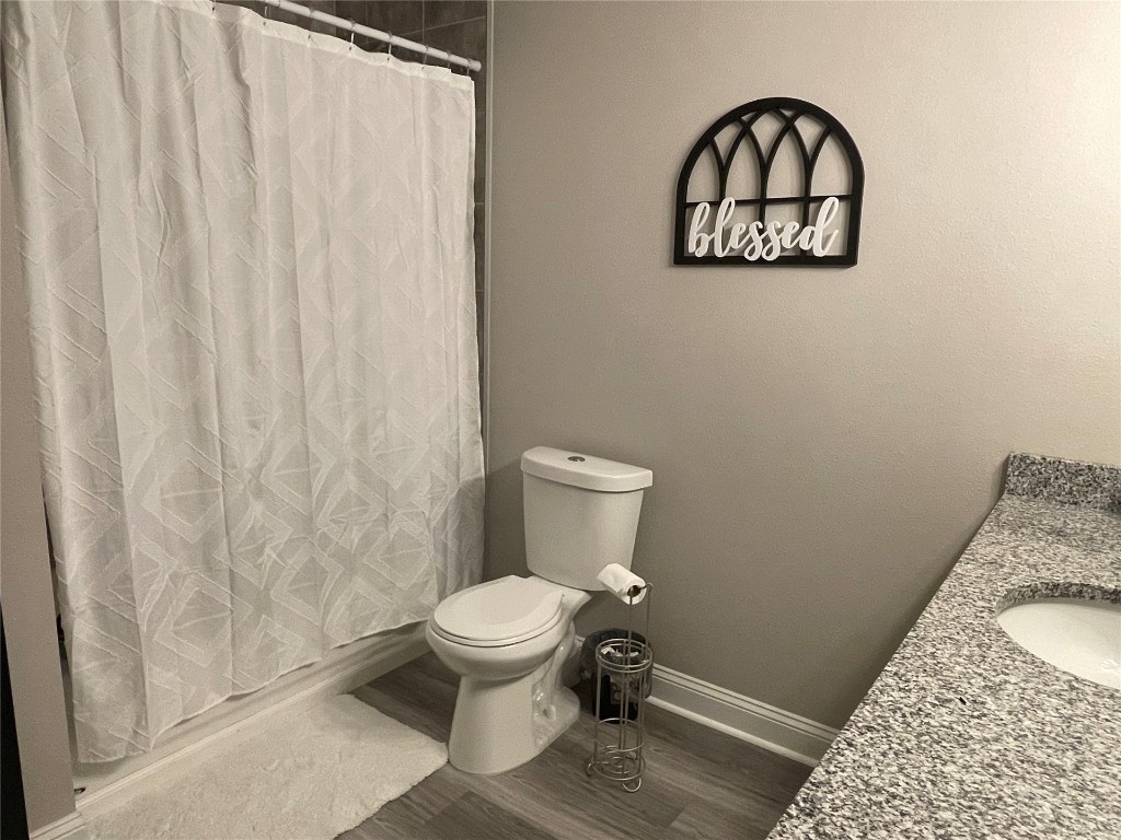 2707 Jane Lane Hilliard, FL 32046 - Photo 10 of 26 a bathroom with a toilet and a sink