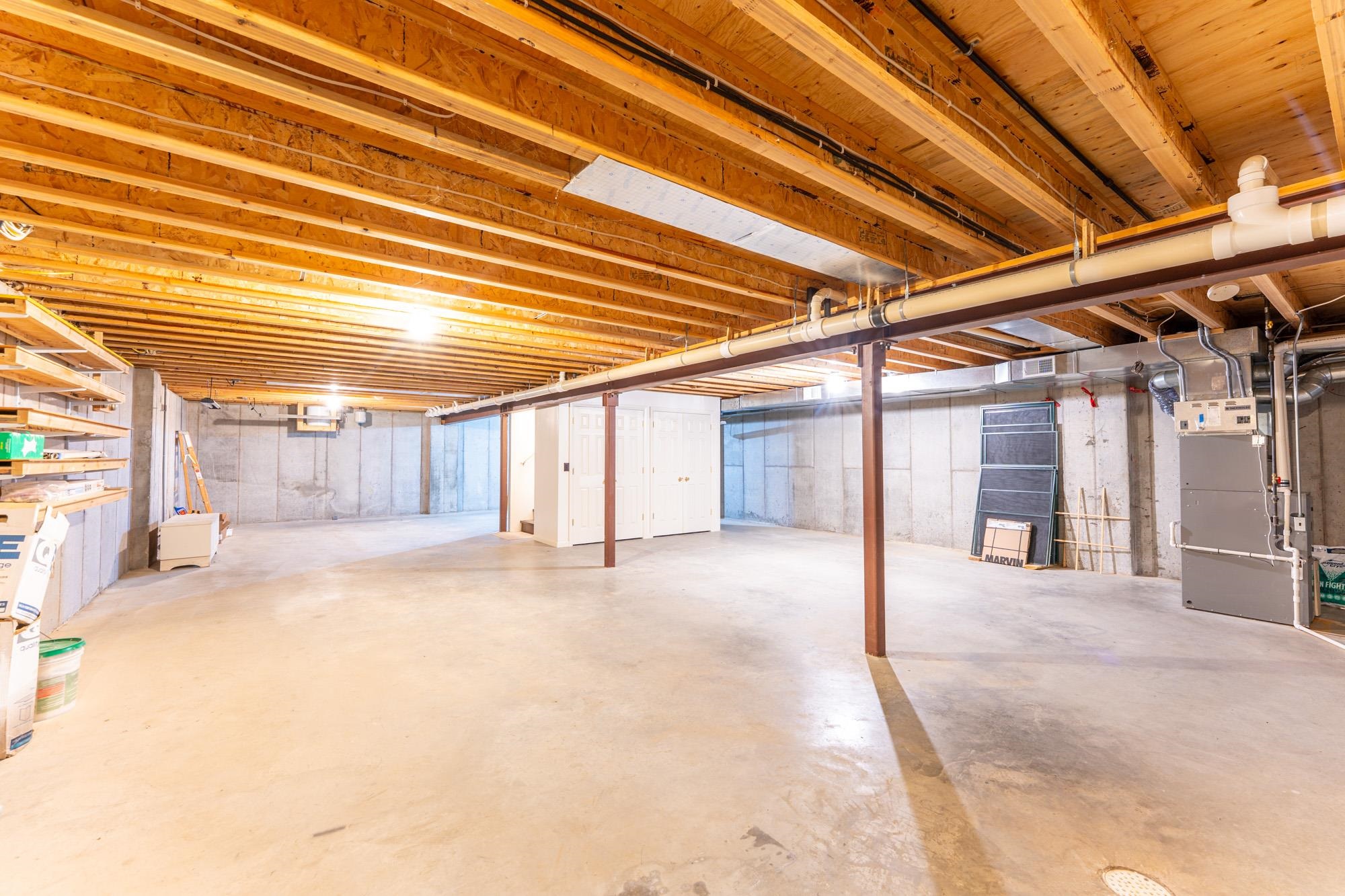 2263 Longstorff Road Ely, MN 55731 - Photo 19 of 49 Unfinished basement with heating unit and visible vents