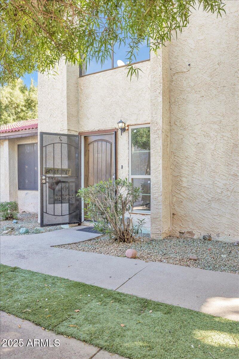 2437 East Tracy Lane, Unit 2 Phoenix, AZ 85032 - Photo 16 of 30 a view of outdoor space and yard