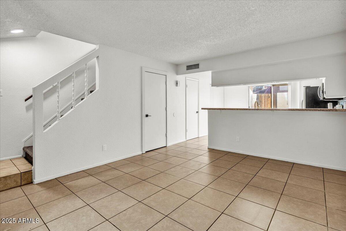 2437 East Tracy Lane, Unit 2 Phoenix, AZ 85032 - Photo 21 of 30 a view of kitchen with cabinets
